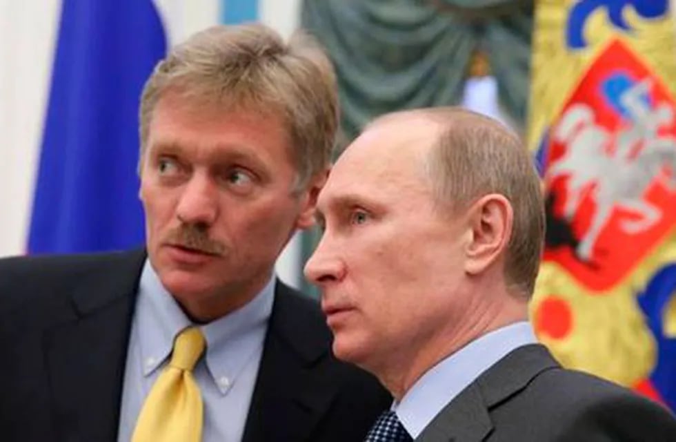 Dmitri Peskov, vocero del gobierno de la Federación Rusa junto a Vladimir Putn, presidente ruso.