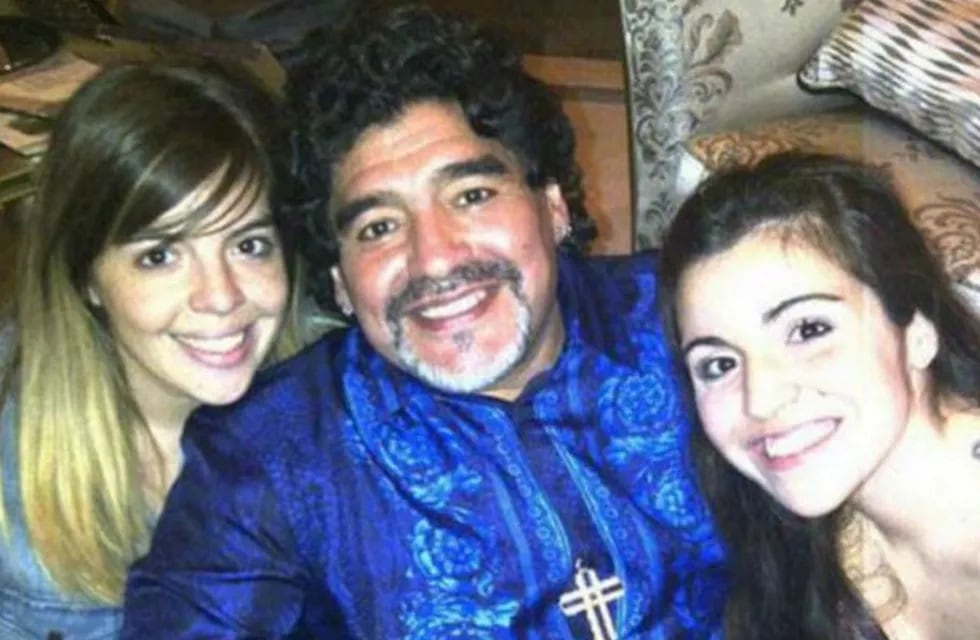 Dalma y Gianinna junto a su papá Diego. / archivo