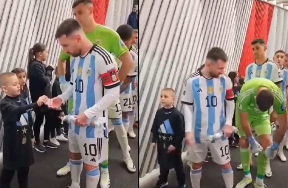 El "Dibu" Martínez juegó todo el partido con dos figuritas en las medias y que le habían regalado a Messi. Foto: Captura video.