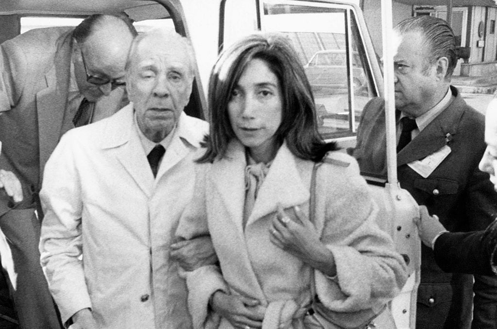 Argentine writer Jorge Luis Borges, accompanied by his secretary Maria Kodama, arrives in Madrid, Spain to receive the Spanish literary prize "Miguel de Cervantes."  A photo exhibit "The Atlas of Borges," displaying about 130 images of Borges during his travels, is on exhibit in New York at the Cervantes Institute during Oct. 2012. Borges and Kodama married in 1986.  (AP Photo, File)