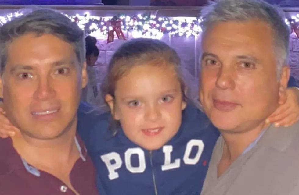 Andrés Galfrascoli y Fabián Núñez junto a su hija Sofía, desaparecidos en Miami (Gentileza TN)
