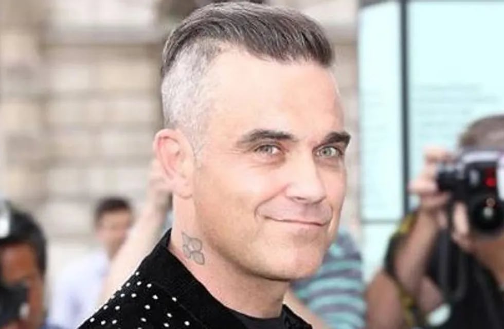 Un ex empresario británico aseguró que conoció a Robbie Williams en una nave extraterrestre.