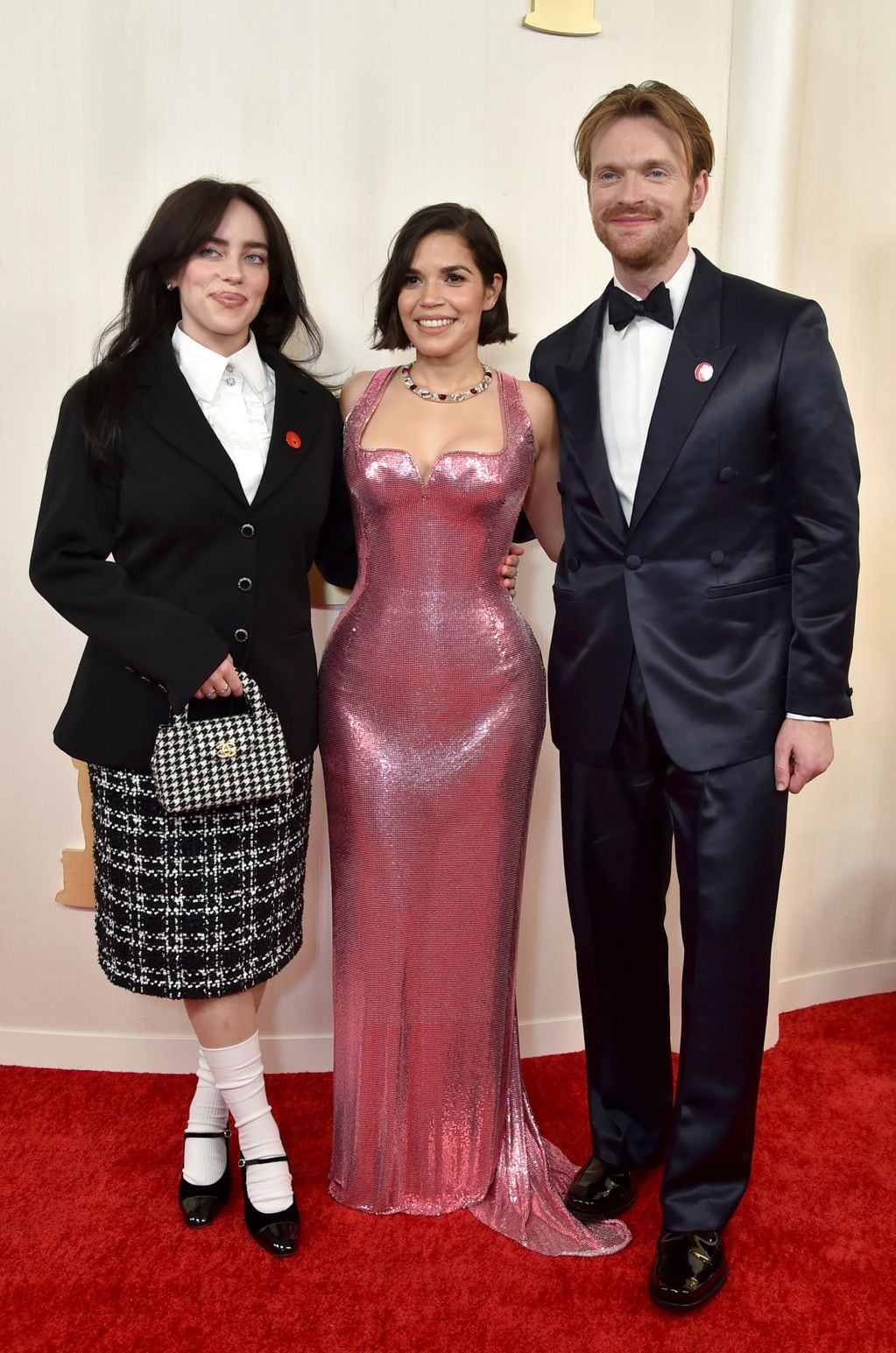 Billie Eilish, from left, America Ferrera and Finneas O'Connell arrive at the Oscars on Sunday, March 10, 2024, at the Dolby Theatre in Los Angeles. (Photo by Richard Shotwell/Invision/AP)
