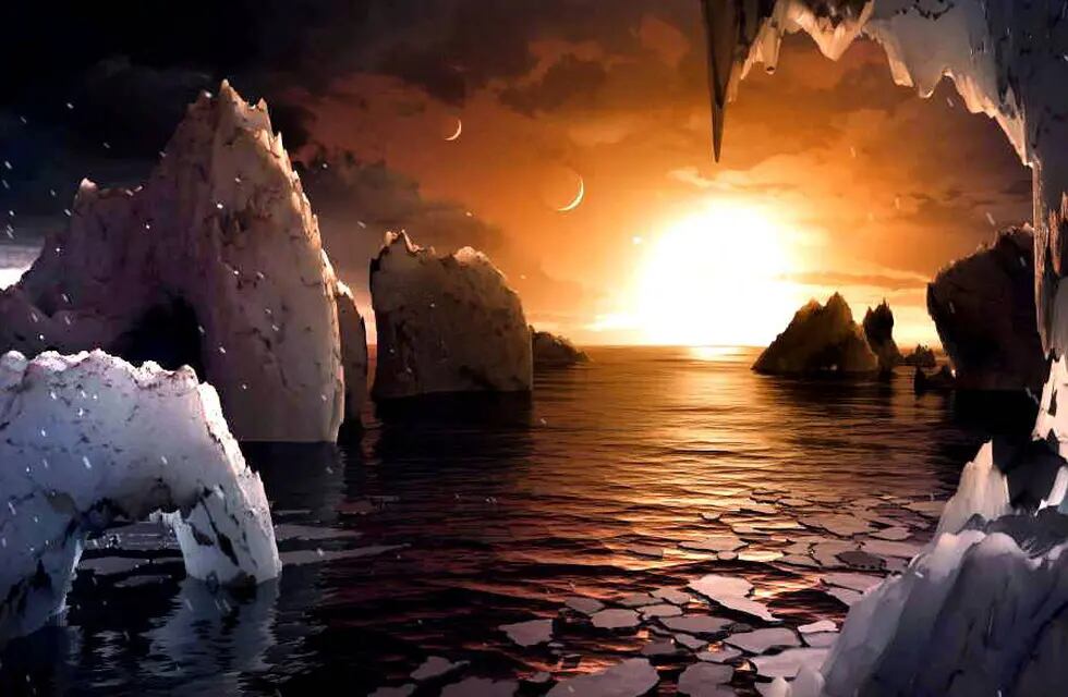 Hallan siete planetas como la Tierra donde puede haber vida.  En el dibujo de la NASA se muestra la ténue luz diurna que emitiría el pequeño sol del sistema.