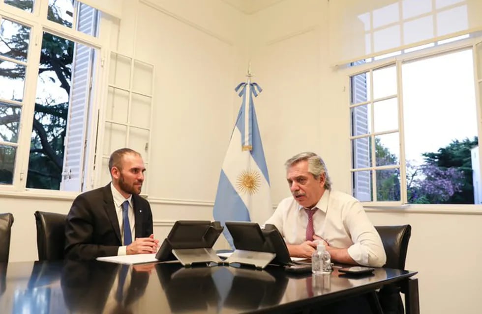 El ministro Martín Guzmán, en reunión con el presidente Alberto Fernández.