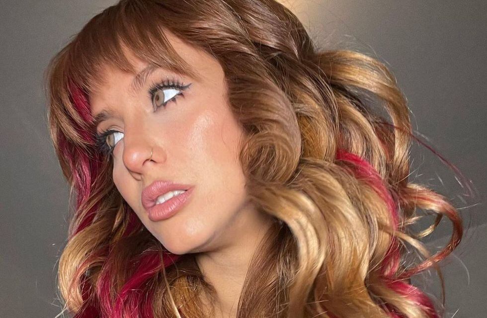 Flor Vigna posed with a pink triangle bikini in different corners of her house and looked like a Barbie