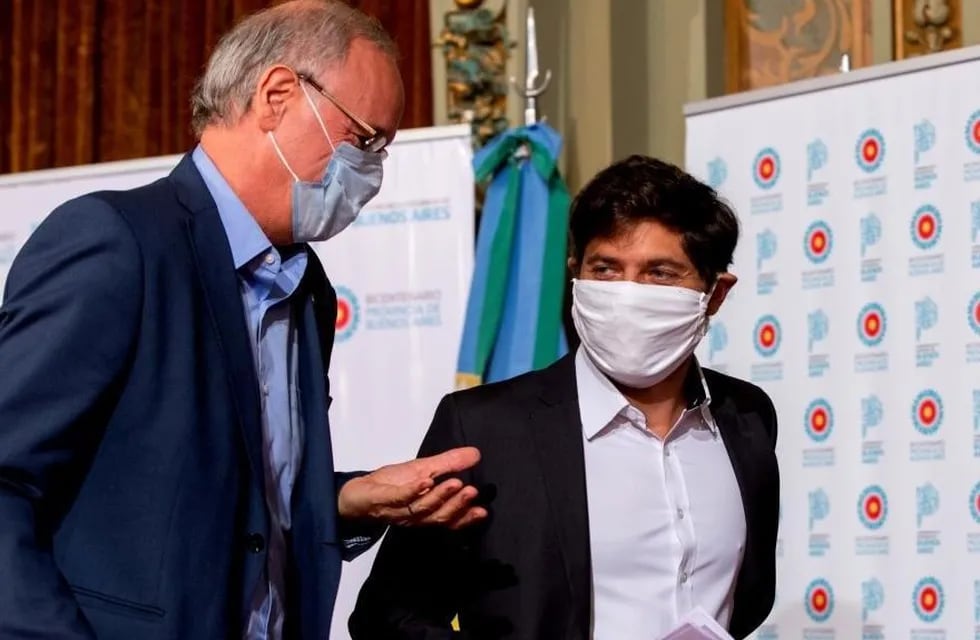 El ministro de Salud bonaerense Daniel Gollán junto al gobernador Axel Kicillof. / archivo Clarín