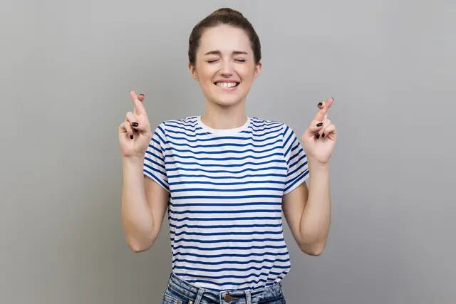 Portrait,Of,Hopeful,Beautiful,Young,Adult,Woman,Wearing,Striped,T-shirt