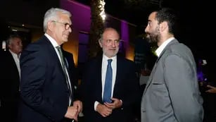 El ministro de Agricultura de la Nación, Julián Domínguez; el presidente del Banco Nación, Eduardo Hecker; y el ministro de Hacienda, Victor Fayad.