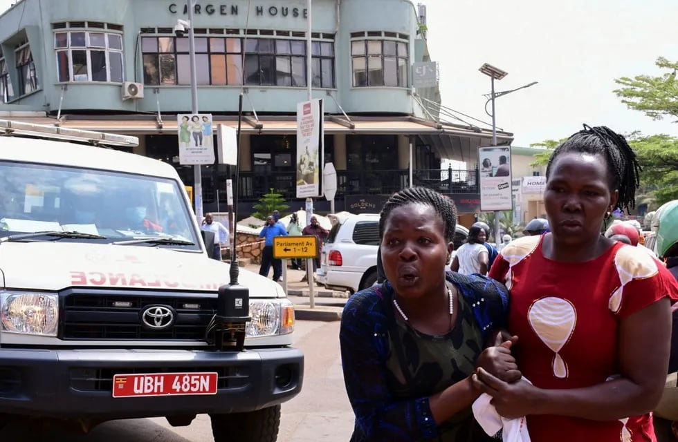 A woman reacts near the scene of a blast in Kampala, Uganda November 16, 2021. REUTERS/Abubaker Lubowa