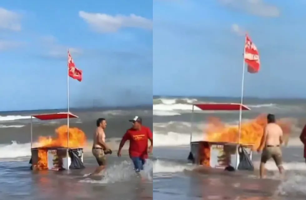 Algunos turistas ayudaron al vendedor a arrojar el puesto ambulante al mar, de otra forma, el episodio podría haber pasado a mayores. Foto: Captura video