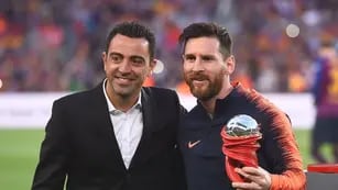Lionel Messi y Xavi Hernández como compañeros en Barcelona.