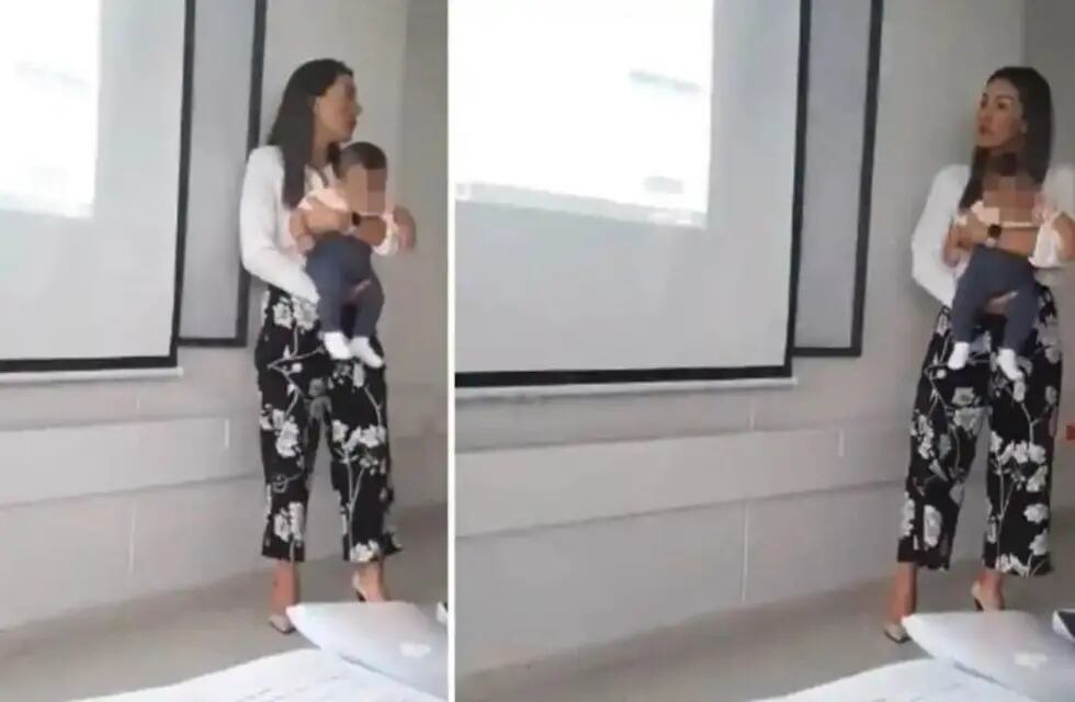 Profesora de derecho carga al bebé de su alumna.