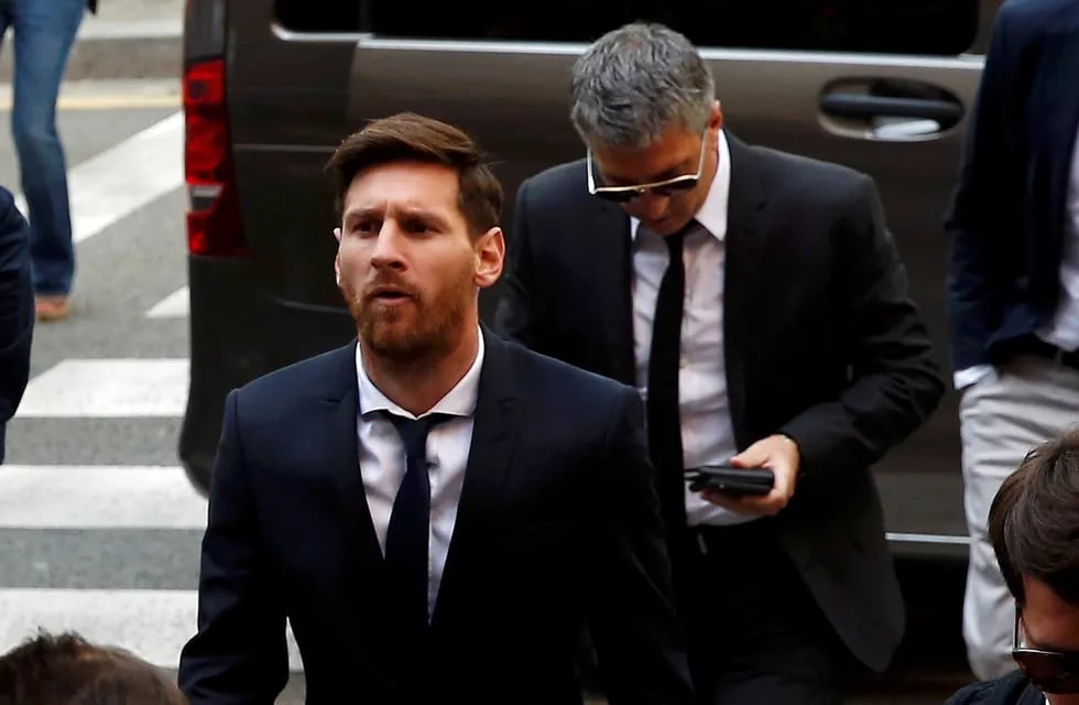 Leo Messi y Jorge, su papá y representante. / archivo