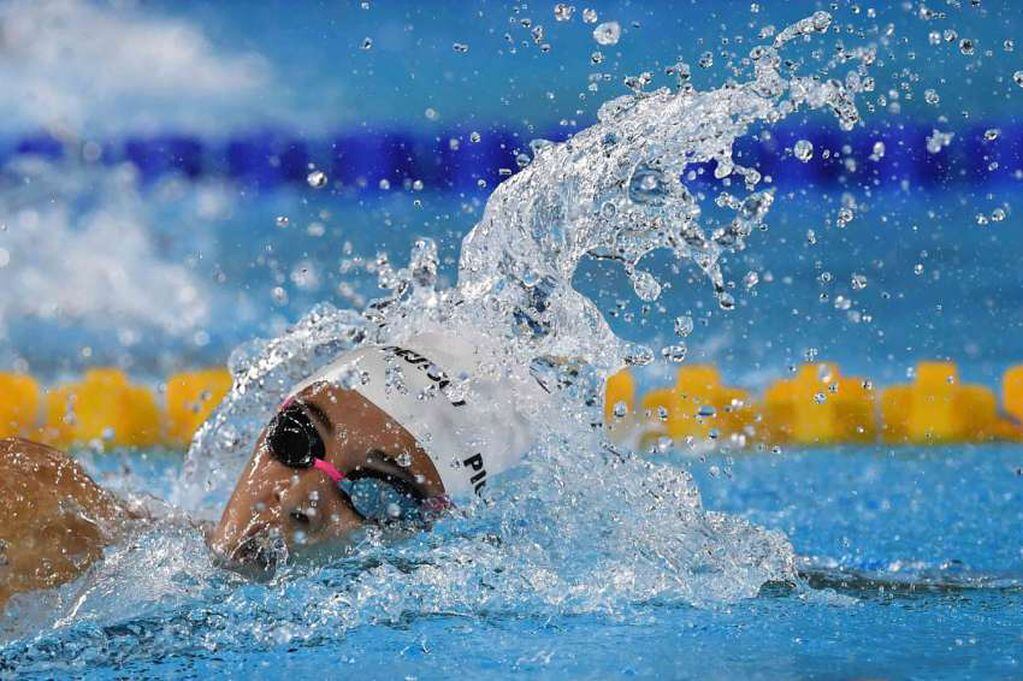 
Foto: AFP | La argentina Delfina Pignatiello compite para ganar la medalla de oro en la final de 400 metros de estilo libre de natación.
   