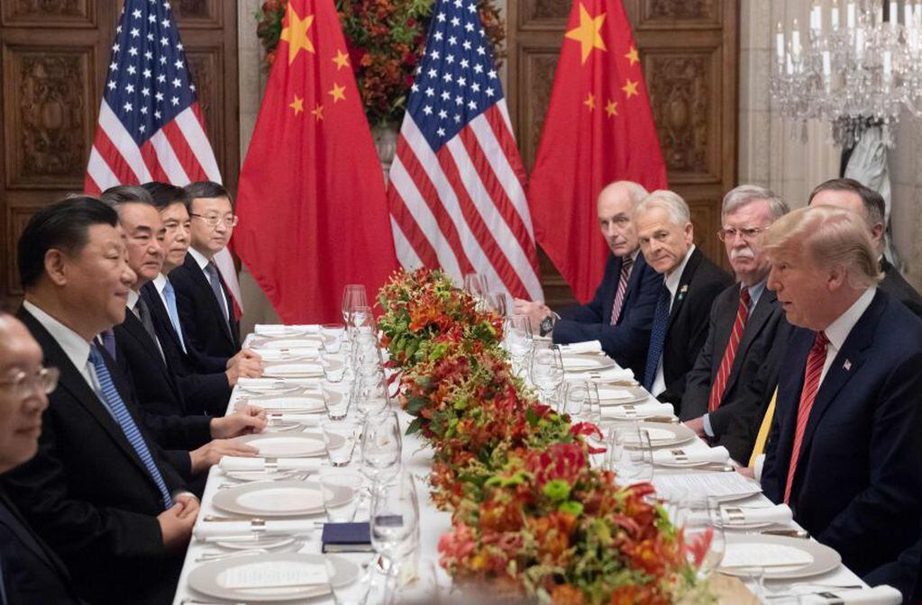 
Trump y Jinping en la misma mesa | AFP
   