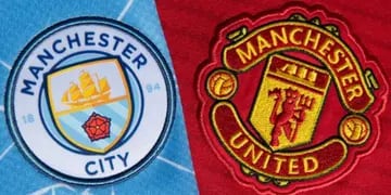 Los escudos de los dos clubes de Manchester