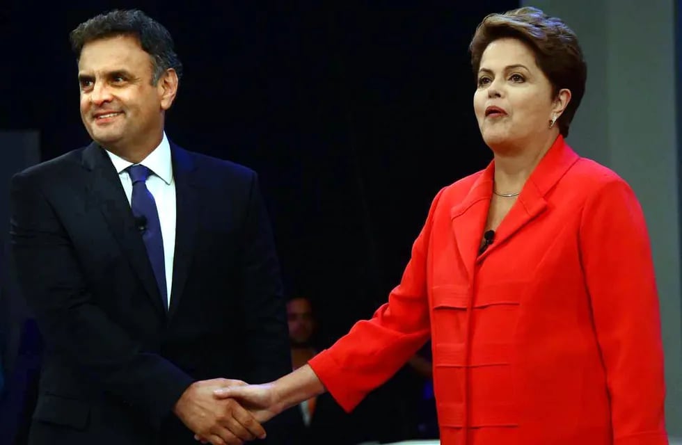 Fin de campaña virulento con Rousseff arriba por 4 puntos 