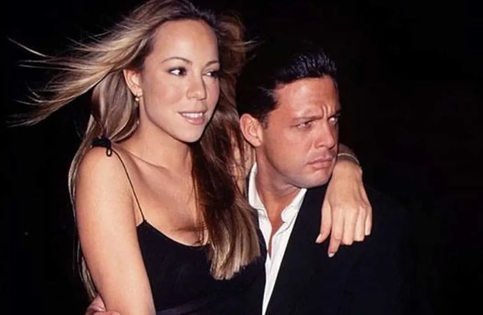 Luis MIguel y Mariah Carey (AP).