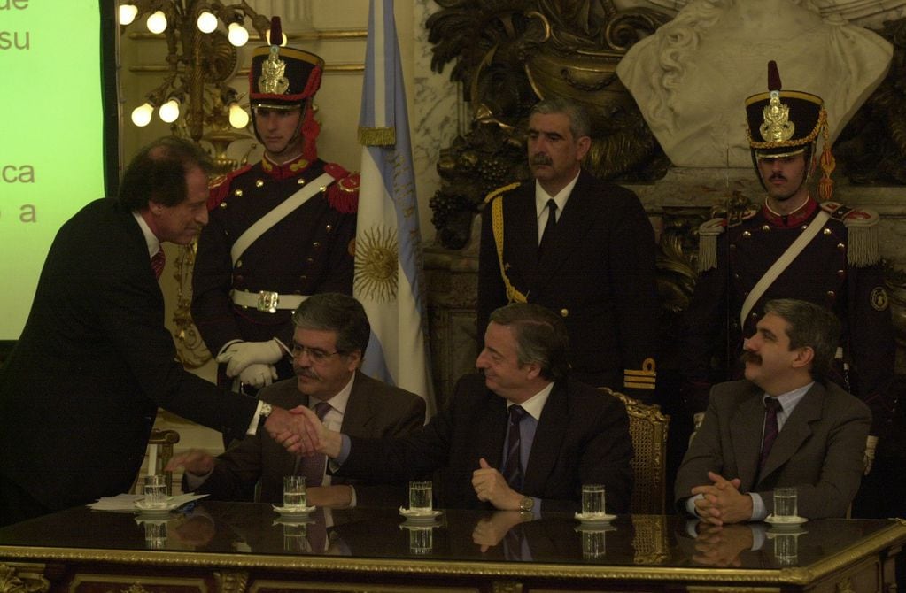 Jorge Brito junto al ex presidente Néstor Kirchner. Foto: Archivo Clarín